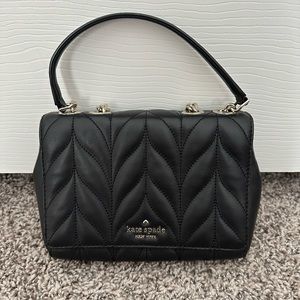 Kate spades black leather with silver chain